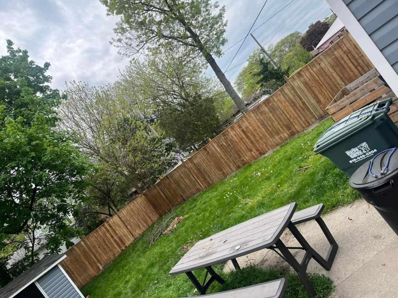 Outdoor deck and fence project by Limitless Contracting